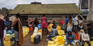 Kibera, Nairobi, Kenya Many people queuing at a newly errected free-water point in the Kibera area in Nairobi