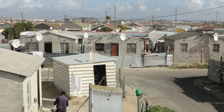 Several small huts in the area of Khayelitsha in Cape Town