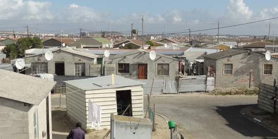 Several small huts in the area of Khayelitsha in Cape Town